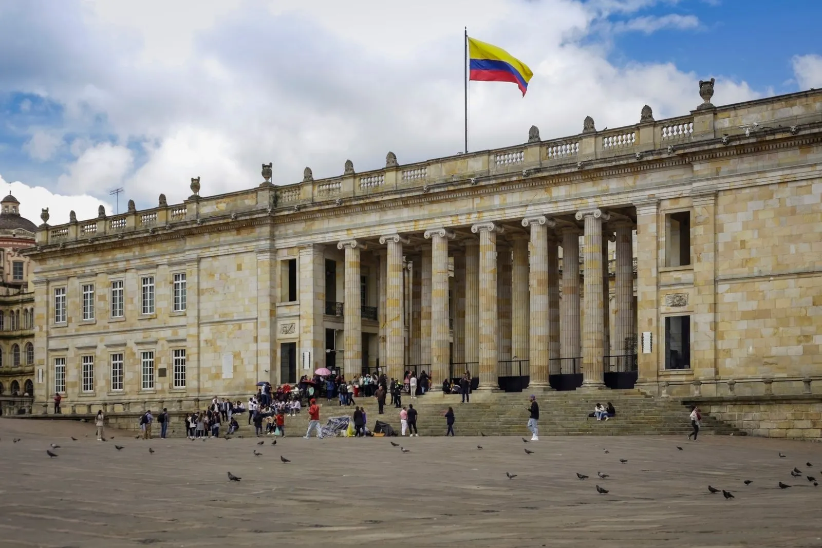 The Capitolio Nacional in Bogotá with the Colombian flag.