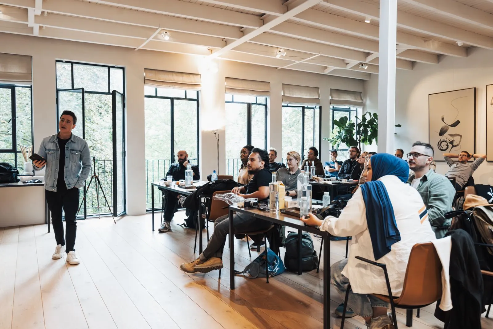People collaborating in a workshop space.